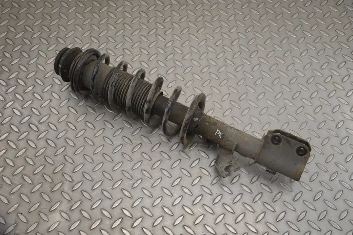 Nissan Micra (2017 - )   Передний амортизатор