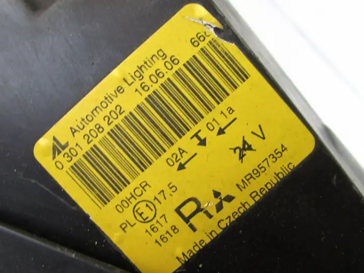 Mitsubishi Colt (2004 - 2008) Передняя фара — фото 7