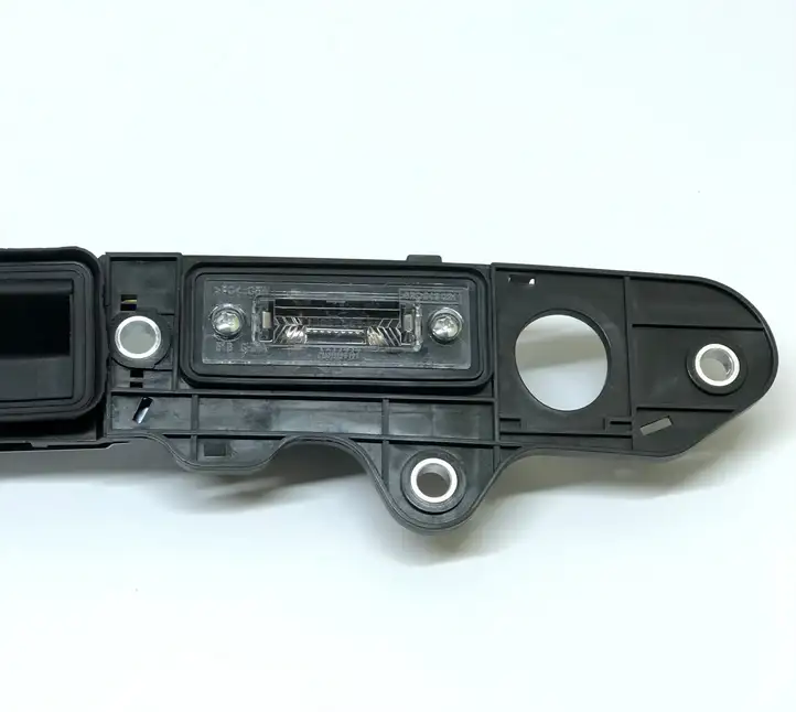 Volkswagen PASSAT B6 (2005 - 2010) 1T0827574A Подсветка номера — фото 3