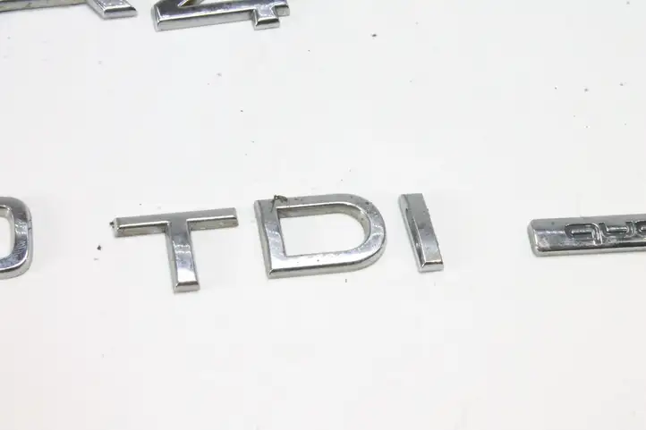 Audi A4 S4 B7 8E 8H (2004 - 2009) Эмблема производителя — фото 4