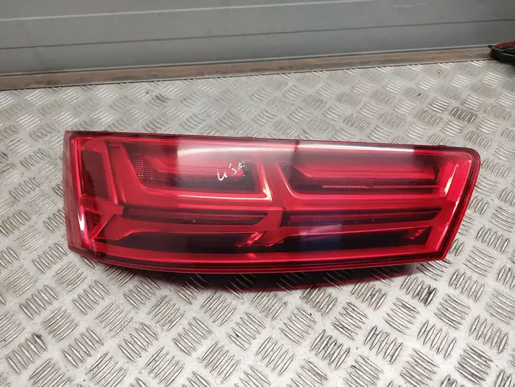 Audi Q7 4M (2015 - ) 4M0945093L Задний фонарь в крышке багажника — фото 1