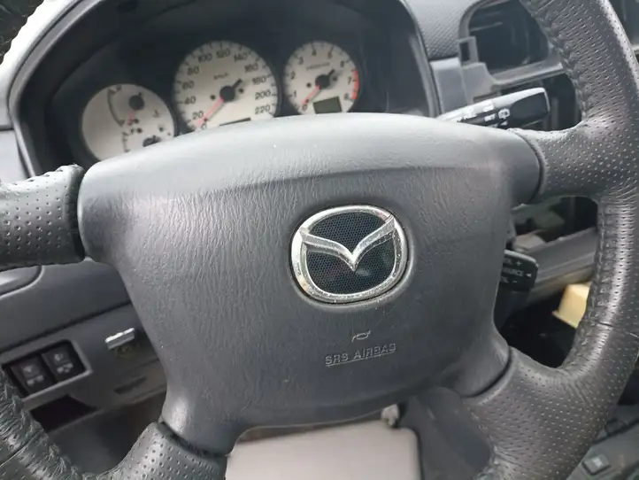 Mazda Premacy (1999 - 2005) Подушка безопасности руля — фото 1