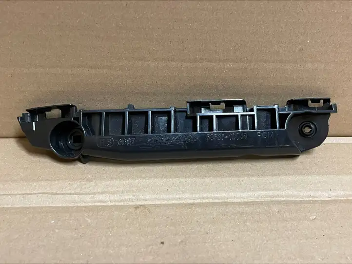 Toyota Yaris (2005 - 2009) 525350D040 Кронштейн переднего бампера — фото 1