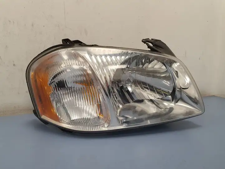 Mazda Tribute (2000 - 2004) 013161129R Передняя фара — фото 1