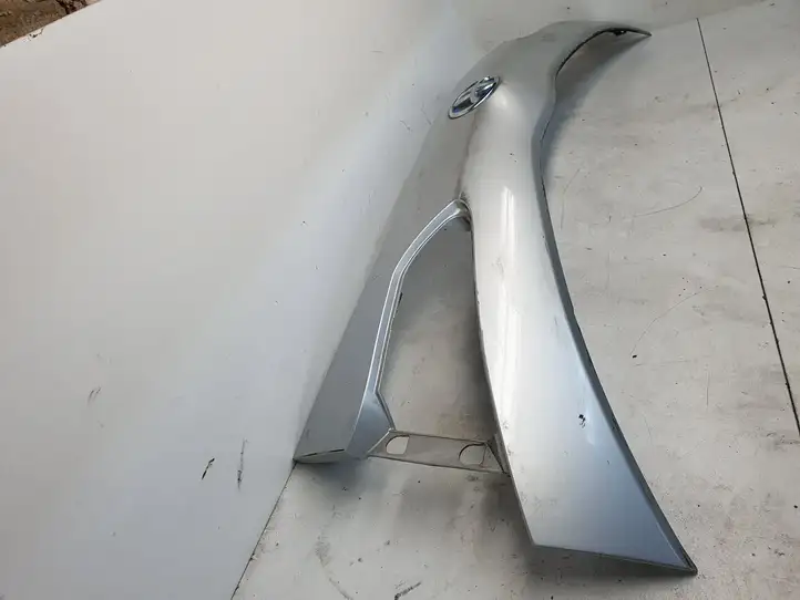 Toyota Yaris (2014 - 2019) 768110DA30 Подсветка номера — фото 4