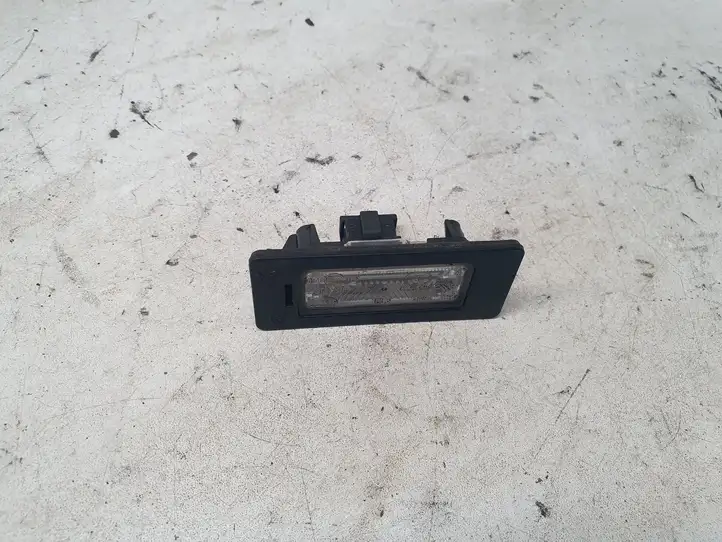 Audi A4 S4 B8 8K (2007 - 2011) 8T0943021 Подсветка номера — фото 1