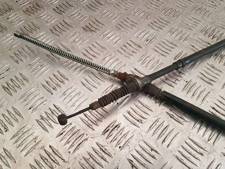 Ford Ranger (2006 - 2009)  5025649 Кабель разблокировки ручного тормоза