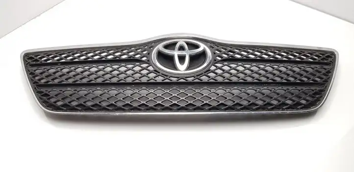 Toyota Corolla E120 E130 (2000 - 2004) 5311402010 Верхняя решетка радиатора — фото 1