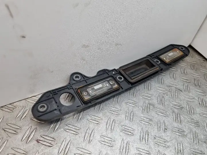 Volkswagen Touran I (2003 - 2010) 1T0827574H Подсветка номера — фото 2