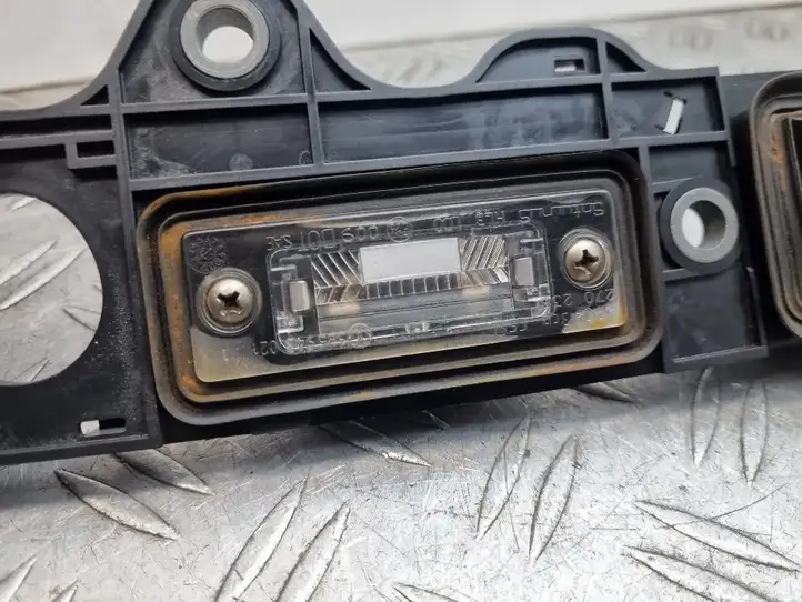 Volkswagen Touran I (2003 - 2010) 1T0827574H Подсветка номера — фото 6