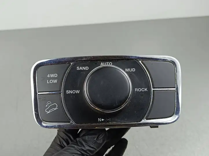 Jeep Grand Cherokee (2010 - 2021) 1173241243185601 Включатель регулировки высоты / жесткости ходовой части — фото 1