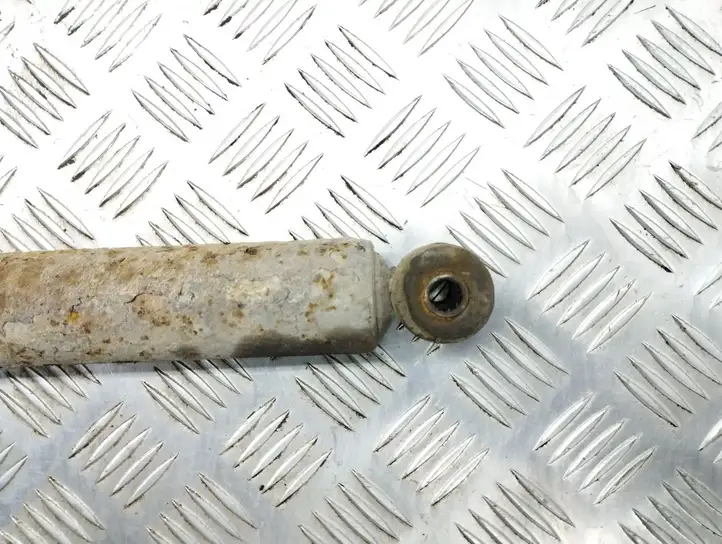 Chrysler Voyager (1996 - 2001)   Задний амортизатор с пружиной