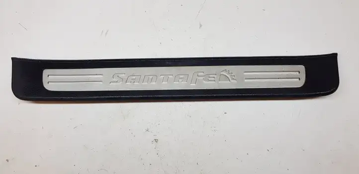Hyundai Santa Fe (2005 - 2009) 858812B000 Внутренняя отделка переднего порога — фото 1