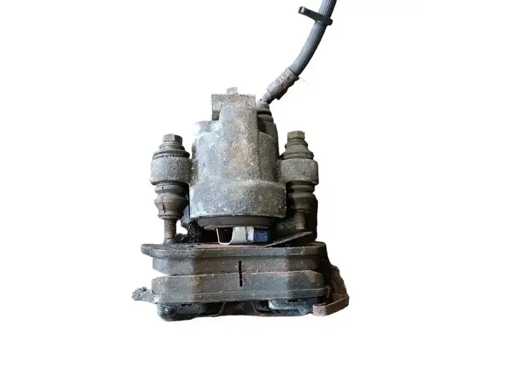 Jeep Grand Cherokee (WK) (2004 - 2010) Тормозной суппорт задний — фото 1