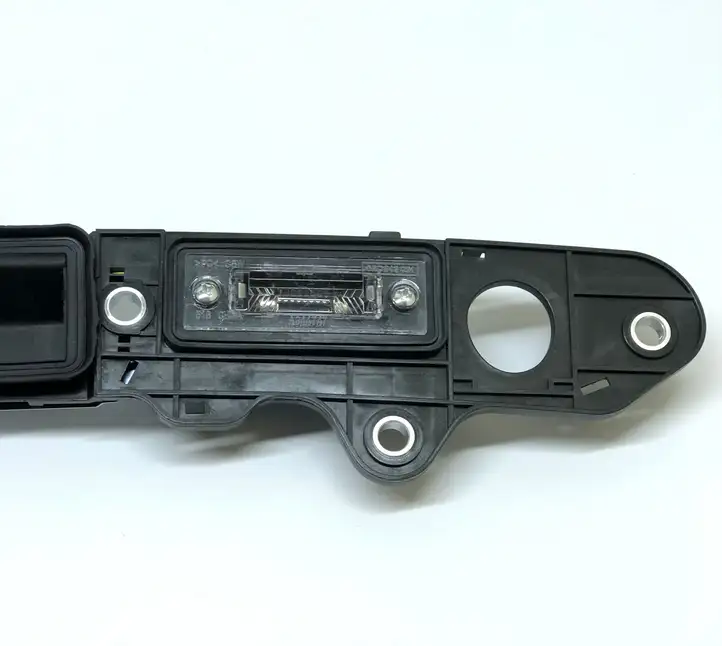 Volkswagen PASSAT B6 (2005 - 2010) 1T0827574A Подсветка номера — фото 3