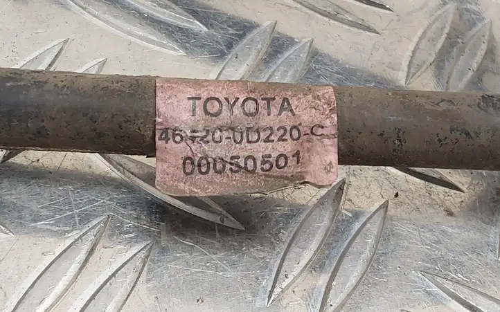 Toyota Yaris (2012 - 2014) 464200D220 Трос ручного тормоза — фото 2