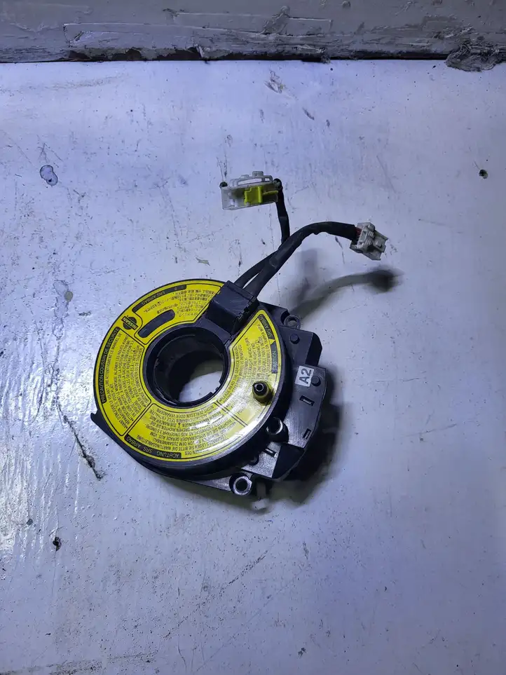 Nissan Almera (2000 - 2006) 82J0898H Контактное кольцо SRS — фото 1