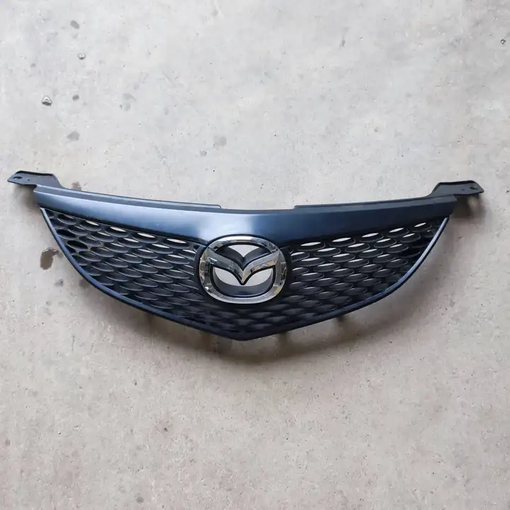 Mazda 3 I (2003 - 2006) BN8V50711 Верхняя решетка радиатора — фото 1