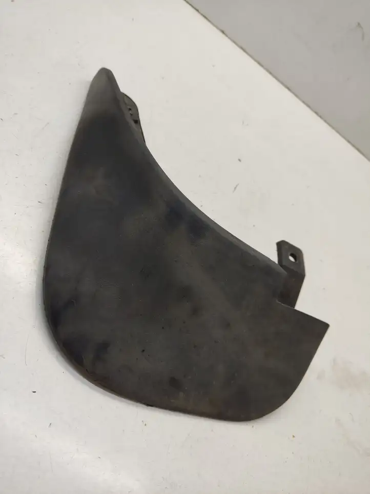 Hyundai Tucson JM (2004 - 2009) 868312E010 Передний брызговик — фото 1