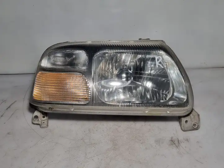 Suzuki Grand Vitara I (1998 - 2005) 10032078 Передняя фара — фото 1
