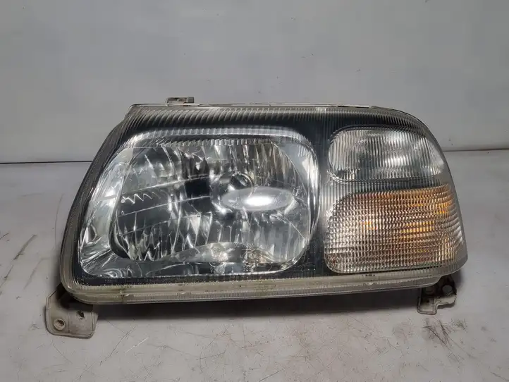 Suzuki Grand Vitara I (1998 - 2005) 10032078 Передняя фара — фото 1