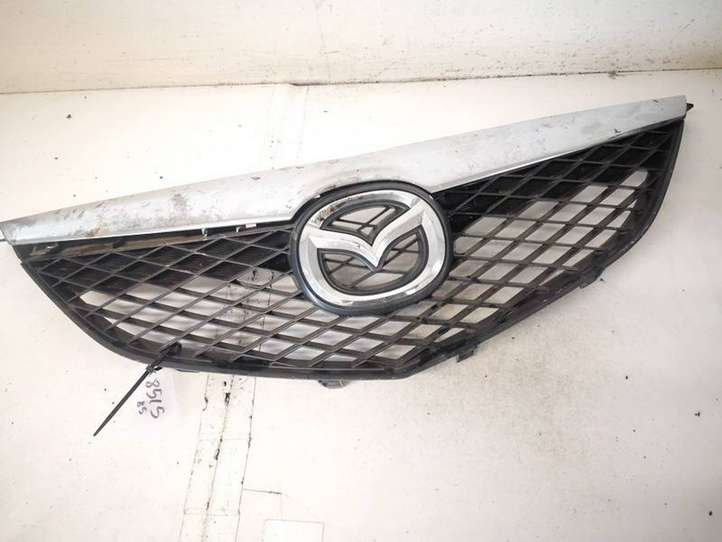 Mazda 6. (2002 - 2005)  gj6a50712 Передняя решётка
