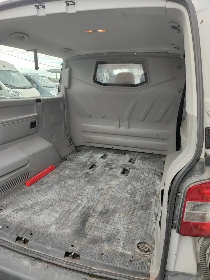 Volkswagen Transporter - Caravelle T5 (2009 - 2015) Панель багажника — фото 1