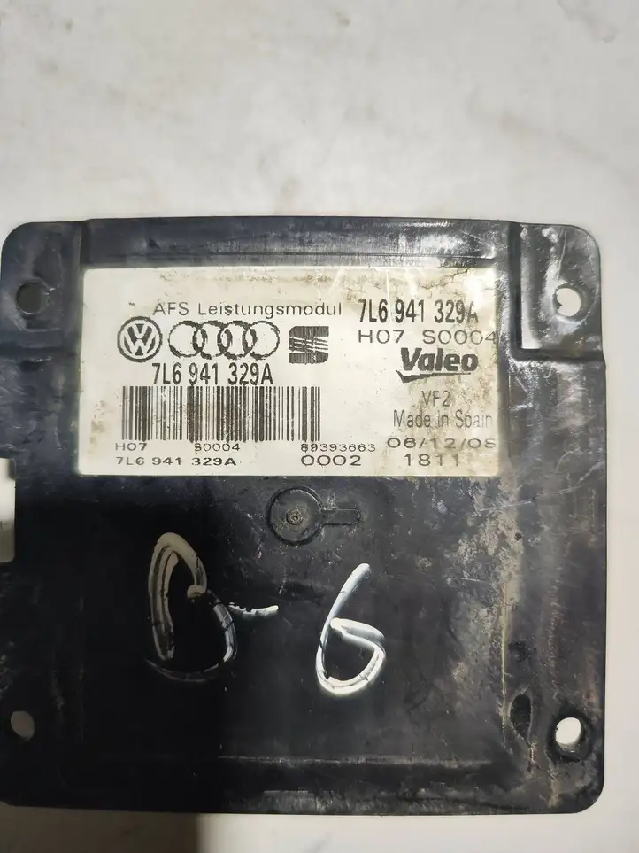 Volkswagen PASSAT B6 (2005 - 2010) 7L6941329A Блок розжига ксенона — фото 1