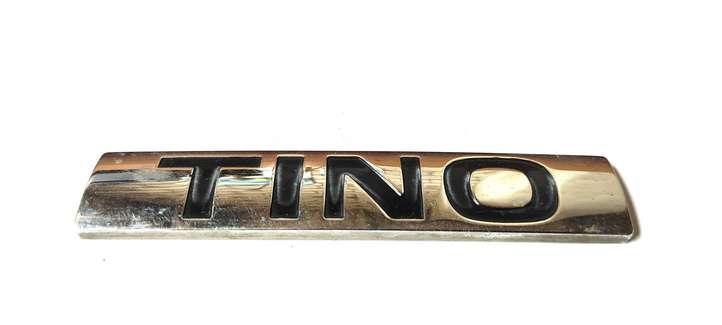 Nissan Almera Tino (2000 - 2006)  90895BU800 Значок производителя / буквы модели