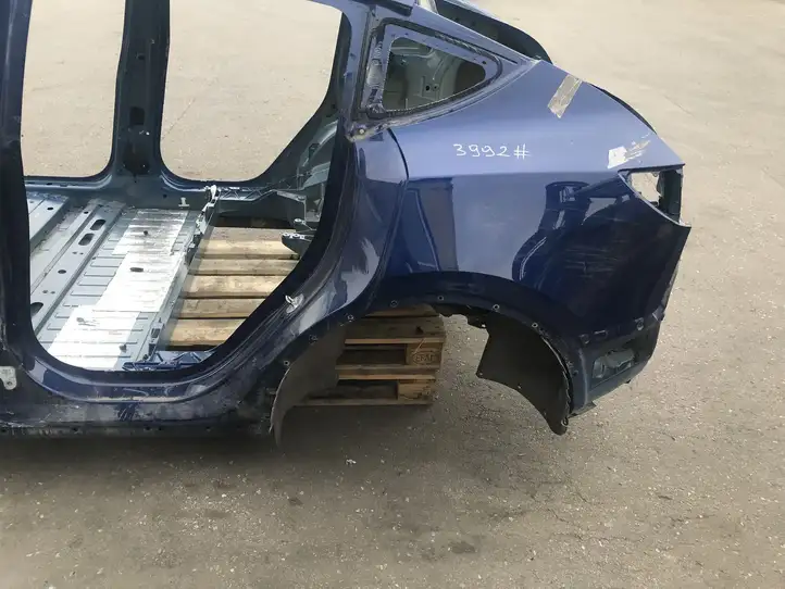 Tesla Model Y (2019 - 2024) Задняя четверть — фото 1