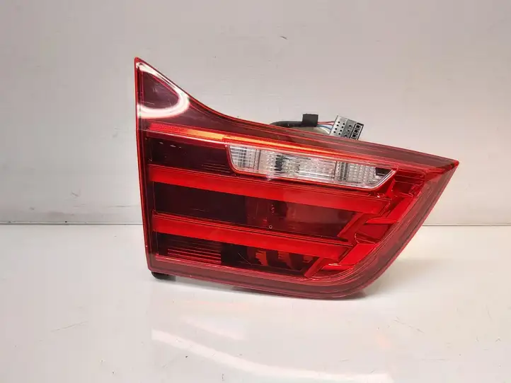 BMW 3 F30 F35 F31 (2012 - 2018) 63217296101 Задний фонарь в крышке багажника — фото 1