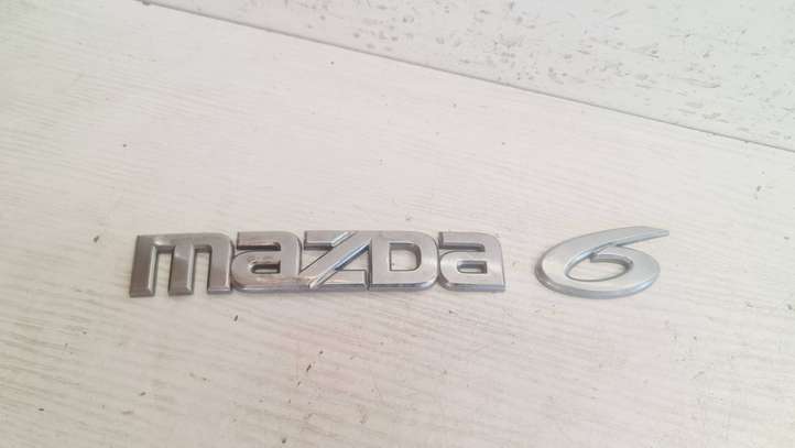 Mazda 6. (2005 - 2007)  GJ6A51721 Значок производителя / буквы модели