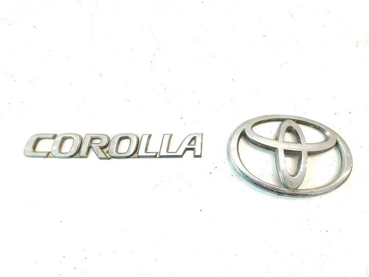 Toyota Corolla E120 E130 (2004 - 2007)  3280T010 Значок производителя / буквы модели