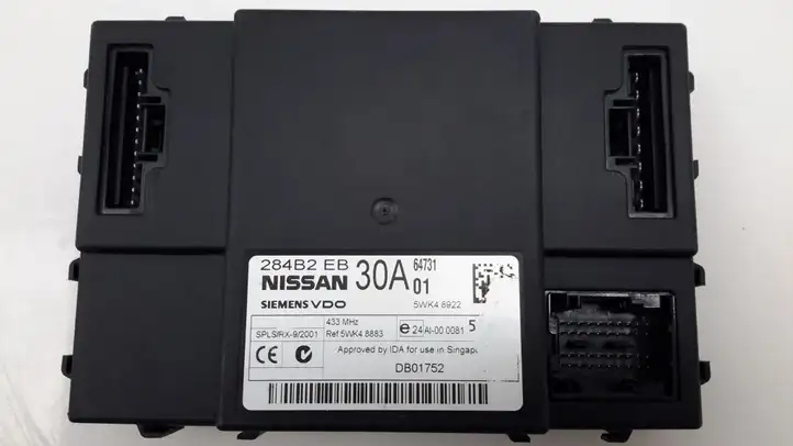 Nissan Navara D40 (2004 - 2015) 284B2EB30A Модуль комфорта — фото 1