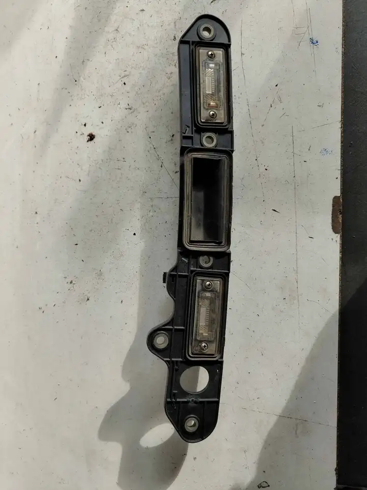 Volkswagen Touran I (2003 - 2010) 1T0827574C Подсветка номера — фото 2