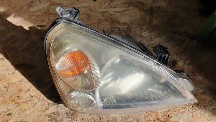 Suzuki Liana (2004 - 2007) 10032662 Передняя фара — фото 1