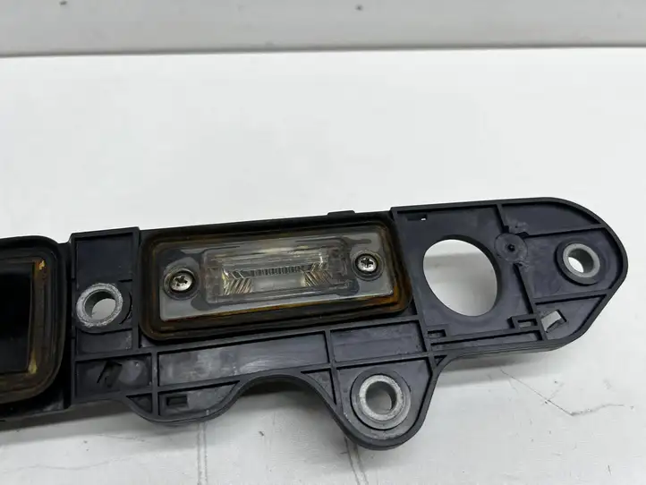 Volkswagen Touran I (2003 - 2010) 6F20 Подсветка номера — фото 4