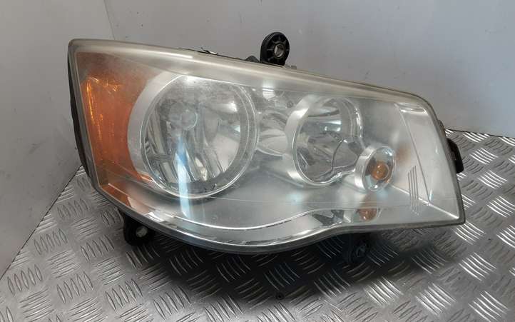 Chrysler Voyager (2007 - 2010)  05113340AD Передняя фара