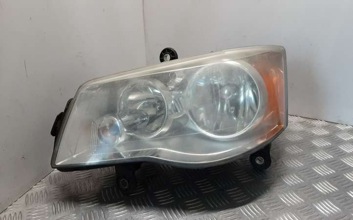 Chrysler Voyager (2007 - 2010)  05113341AD Передняя фара