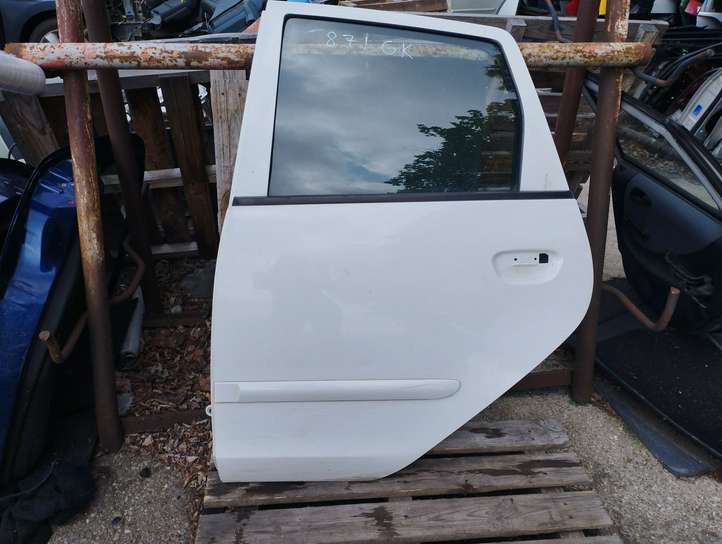 Mitsubishi Colt (2008 - 2012)   Задняя дверь