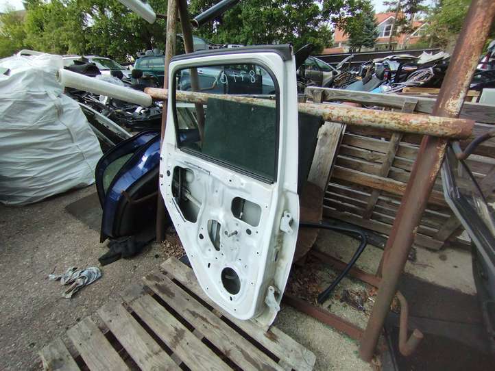 Mitsubishi Colt (2008 - 2012)   Задняя дверь