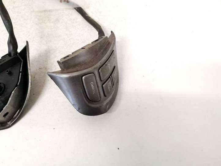 Subaru Outback (2007 - 2009)   Кнопки рулевого колеса