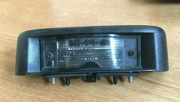 Renault Trafic II (X83) (2002 - 2014) 8200211477 Подсветка номера — фото 1