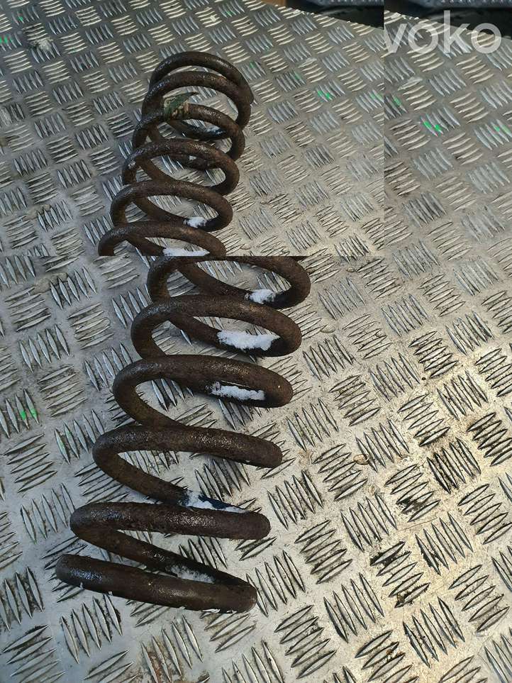 Jeep Grand Cherokee (1998 - 2004)  52089421 Пружина