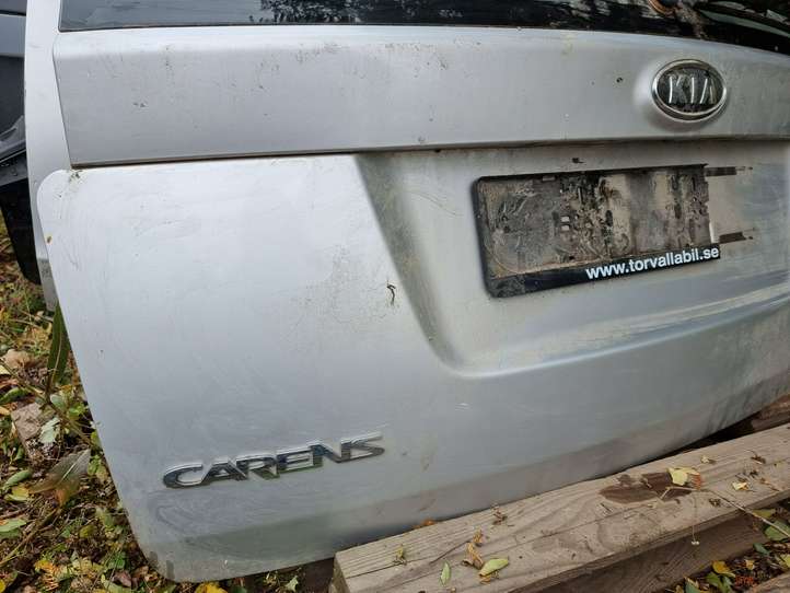 Kia Carens (2006 - 2012)   Задняя крышка (багажника)