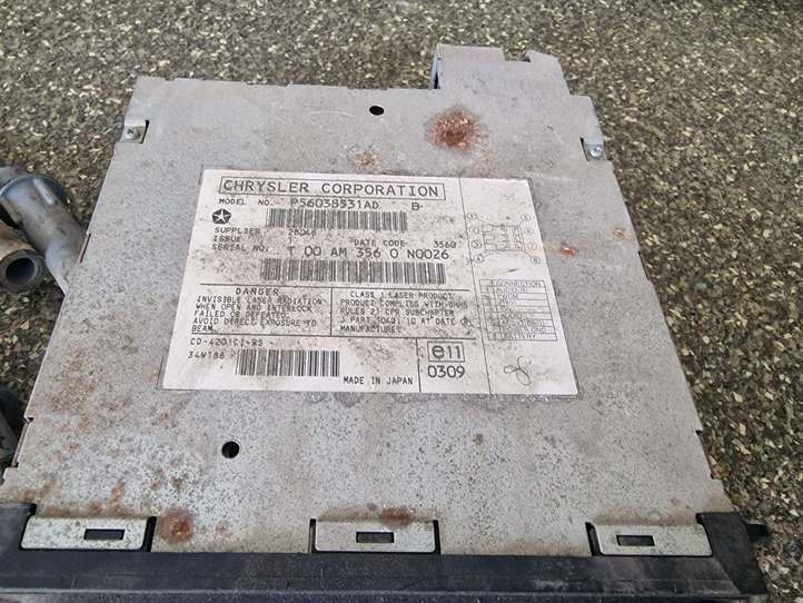 Chrysler Voyager (2001 - 2004)  P56038531AD CD/DVD чейнджер