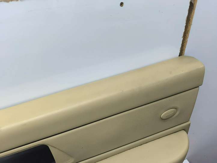 Land Rover Range Rover Sport (2005 - 2009)  EJB502200XXX Обшивка передней двери