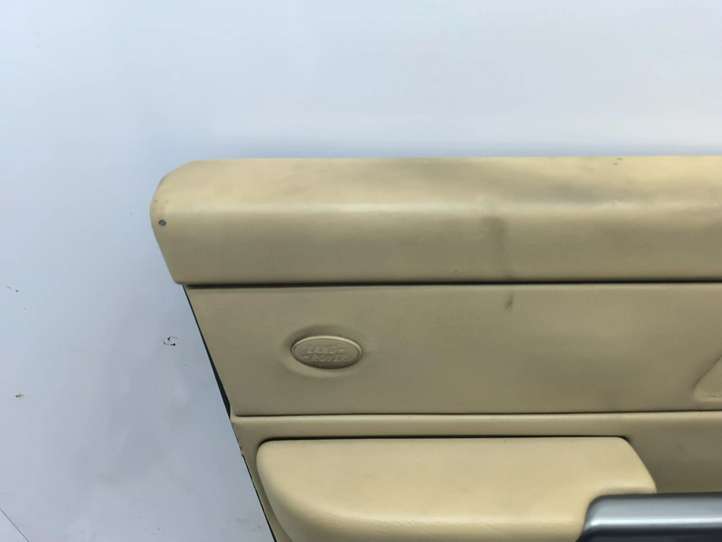 Land Rover Range Rover Sport (2005 - 2009)  EJB502250XXX Обшивка передней двери