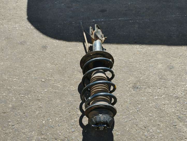 Toyota Yaris (2005 - 2009)  4851052C30 Передний амортизатор с пружиной