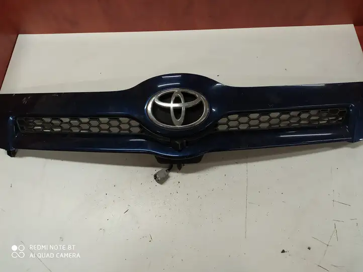 Toyota Corolla Verso AR10 (2004 - 2009) 531110F020 Передняя решетка — фото 1